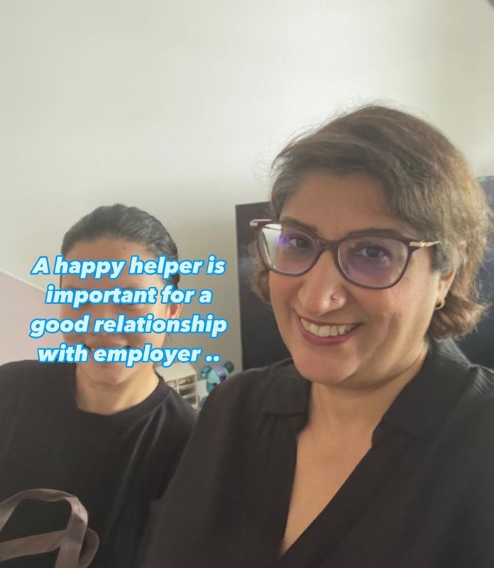 Salwin with one of her placed helpers, captioned: a happy helper is important for a good relationship with employer